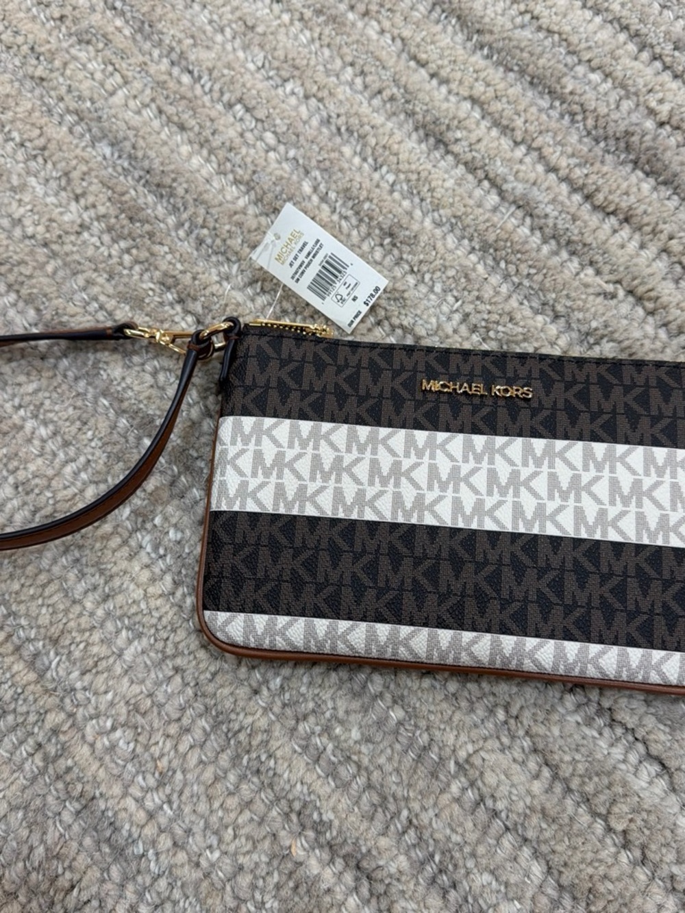 Michael Kors Brown and White MK Signature Stripe Wristlet